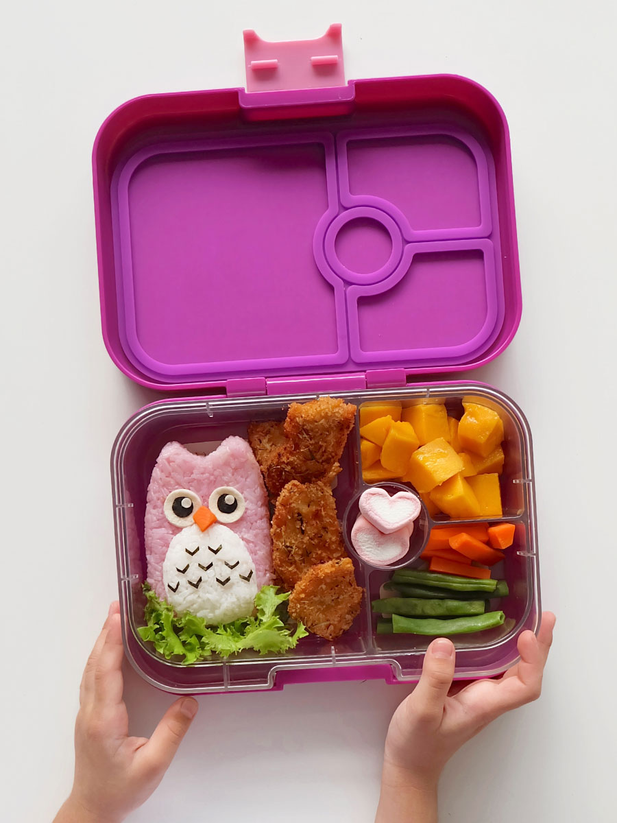 Owl bento food art inside a Yumbox Panino in Bijoux Purple Owl bento food art inside a Yumbox Panino in Bijoux Purple
